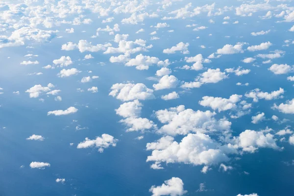 clouds above ocean, aerial shot above clouds