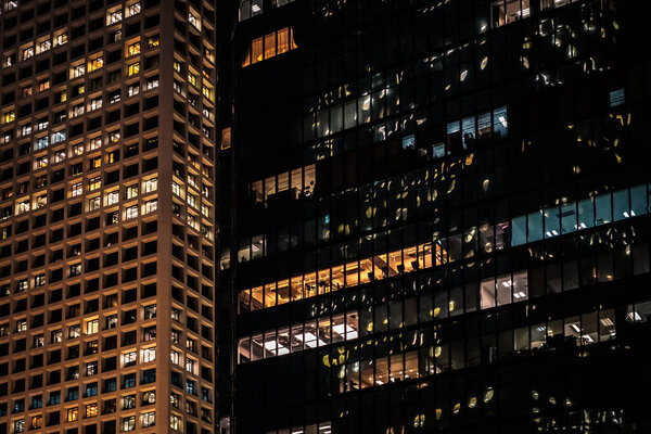 Modern office buildings at night, cityscape -
