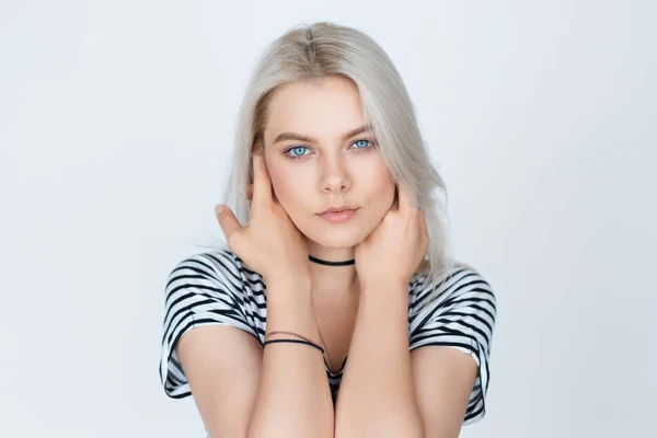 Blonde girl on white background close-up — Stock Photo, Image