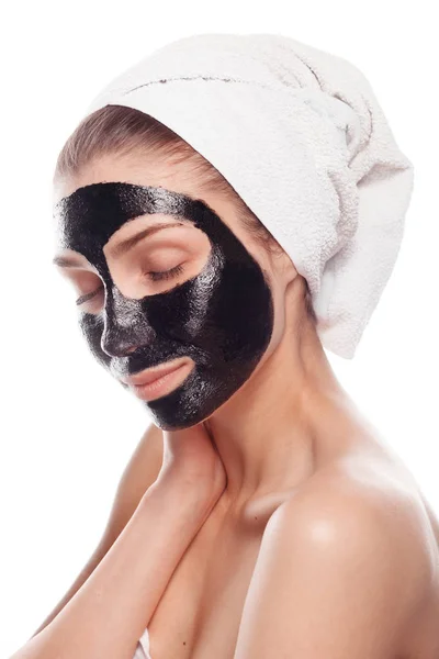 Ung kvinna med svart mask — Stockfoto