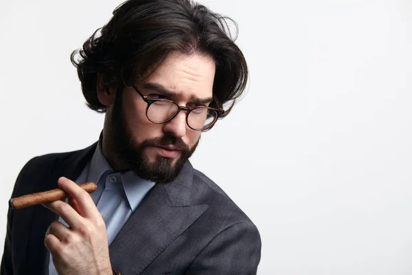 Stylish businessman with cigar — Stock Photo, Image