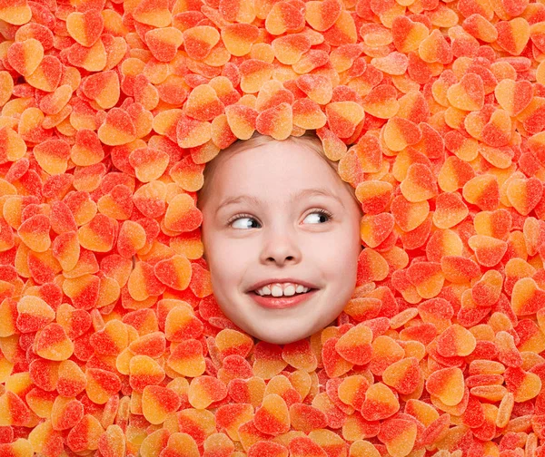 Little girl lying in jellies