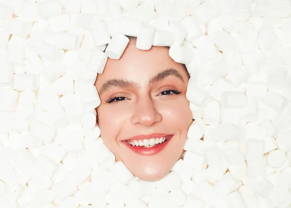 Content model posing in fluffy marshmallows — Stock Photo, Image