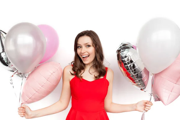 Frau im Kleid posiert mit Luftballons — Stockfoto