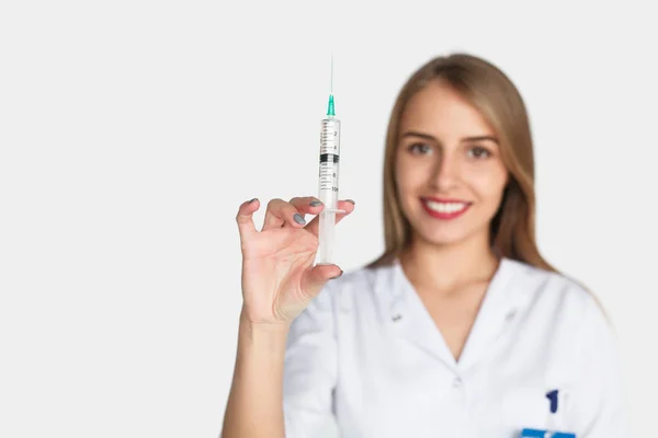 Woman posing with syringe — Stock Photo, Image