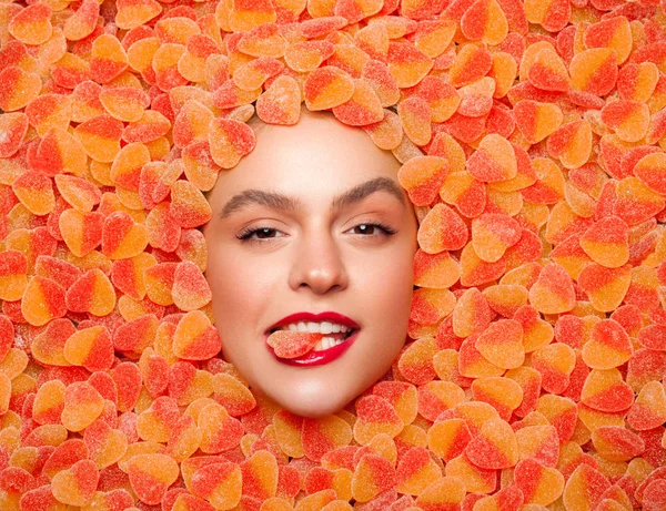 Woman lying in fruit jelly — Stock Photo, Image