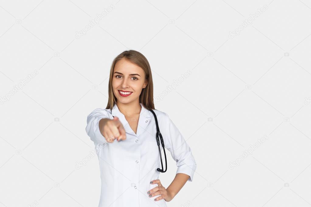 woman in medical gown with stethoscope