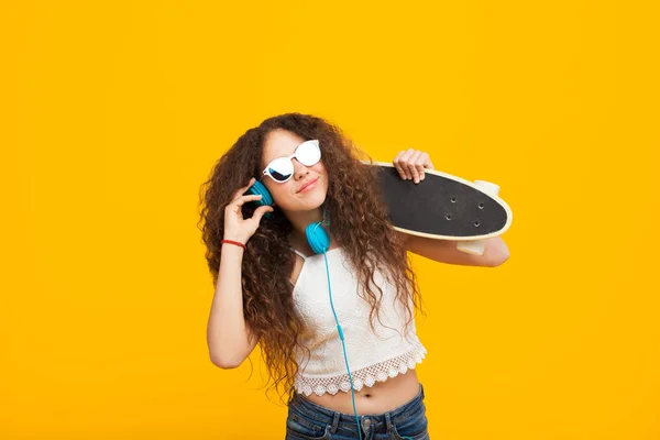 Trendy hipster girl with longboard — Stock Photo, Image