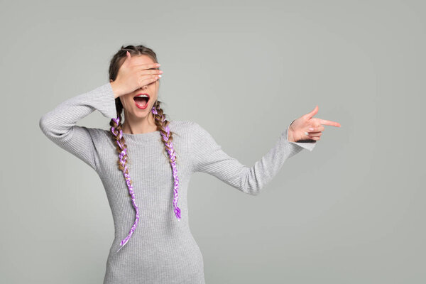 Young woman posing in dress
