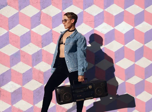 Stylish hipster girl posing with boombox — Stock Photo, Image