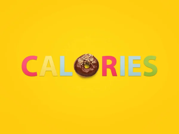 Composição brilhante de donut e calorias de palavra — Fotografia de Stock