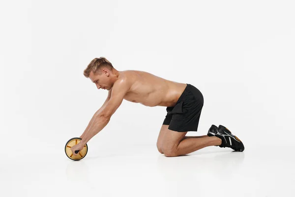 Sportsman trénink břišních svalů — Stock fotografie