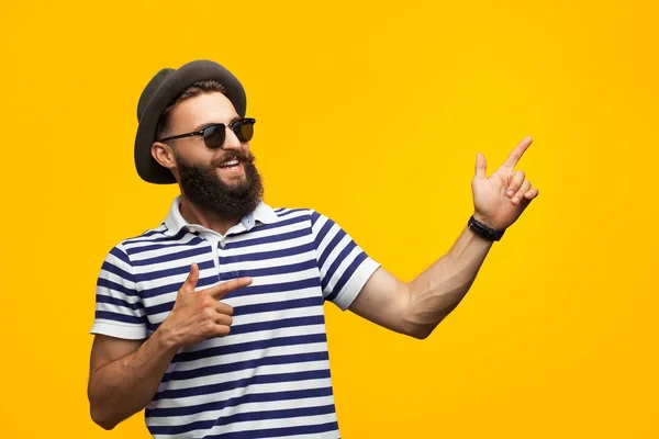 Young cheerful man on orange — Stock Photo, Image