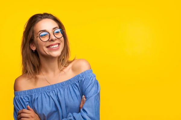 Cheerful stylish model on orange — Stock Photo, Image