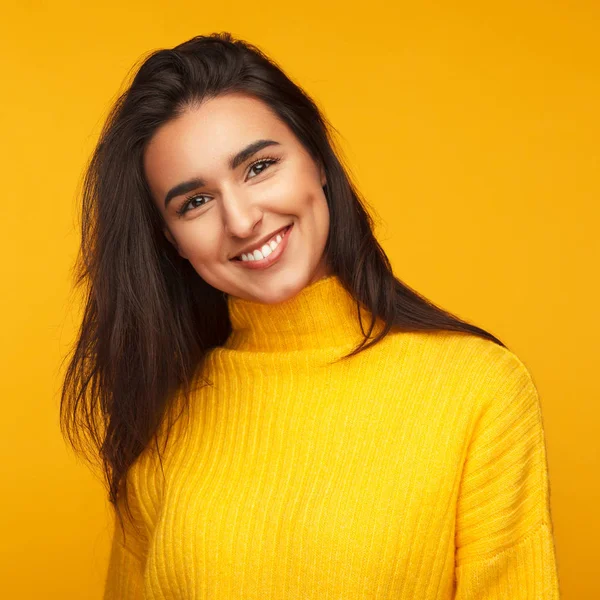 Cute brunette girl in colorful clothes — Stock Photo, Image