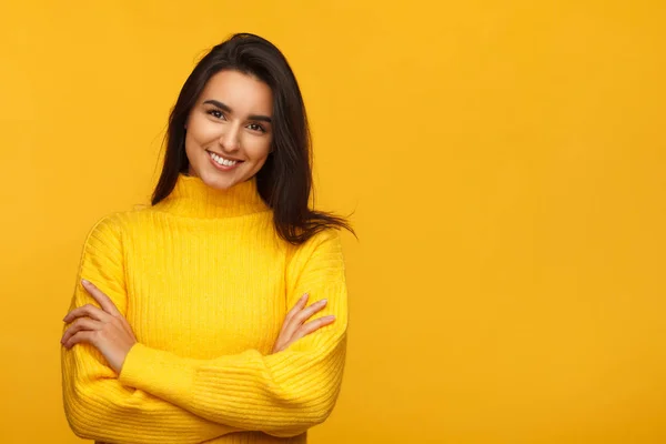 Charming female on yellow backdrop — Stock Photo, Image
