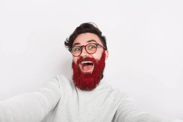 Excited crazy hipster with glowing beard — Stock Photo, Image