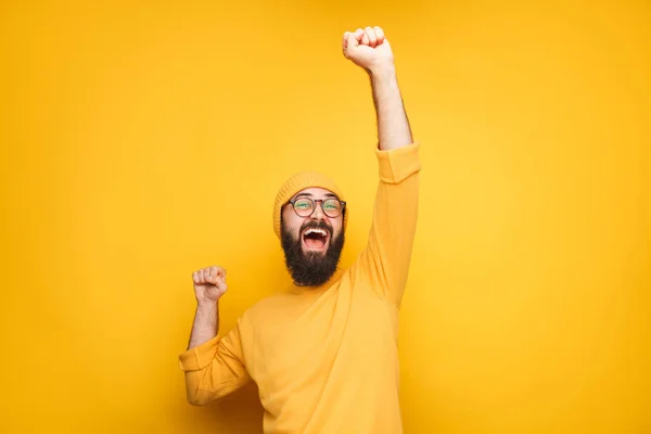 Young bearded hipster posing expressively — Stock Photo, Image