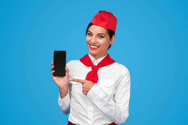 Cheerful stewardess advertising airline app