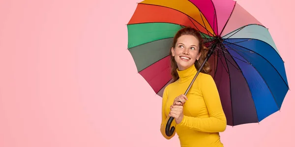 Happy young female with colorful umbrella — Stock Photo, Image