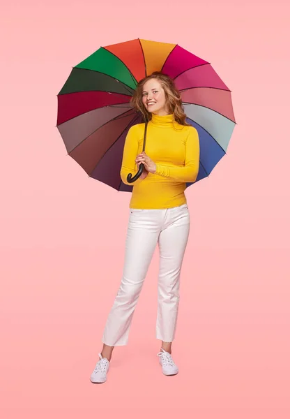 Joyful young woman with colorful umbrella — Φωτογραφία Αρχείου