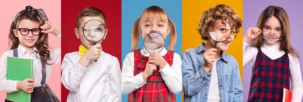 Petites filles et garçons curieux avec loupes ou lunettes — Photo