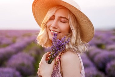 Happy lady with lavender bouquet