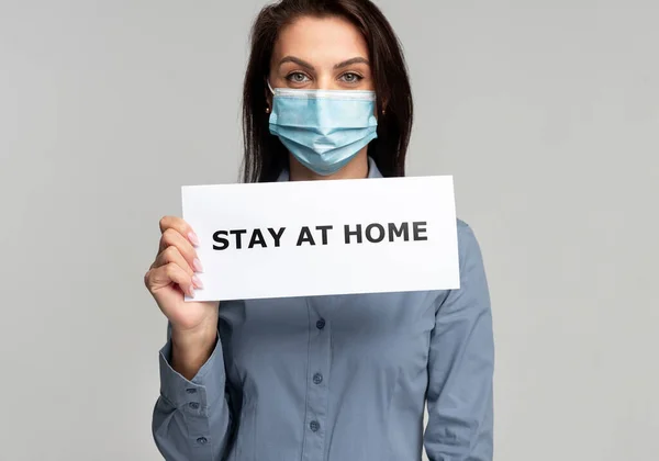 Woman with Stay at home banner