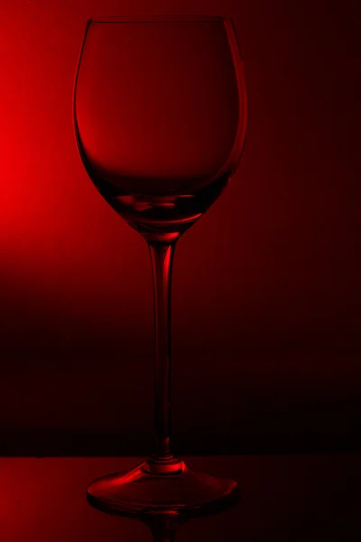 Wine glass on red — Stock Photo, Image