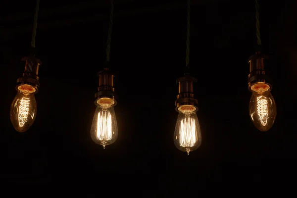 Some light bulbs on black — Stock Photo, Image