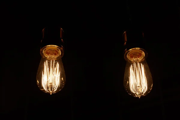 Alcune lampadine su nero — Foto Stock