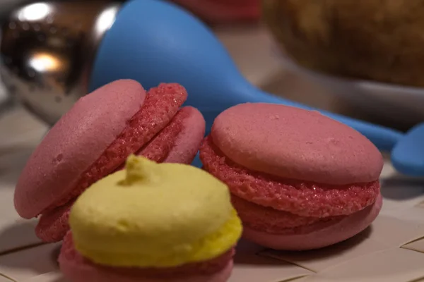 Pink macarons on a plate — Stock Photo, Image