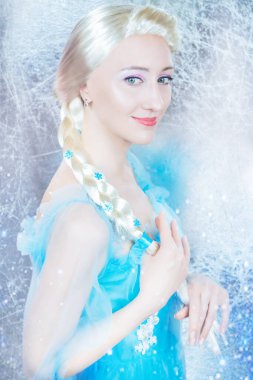 Frozen princess on the snowy silver background close up. clipart