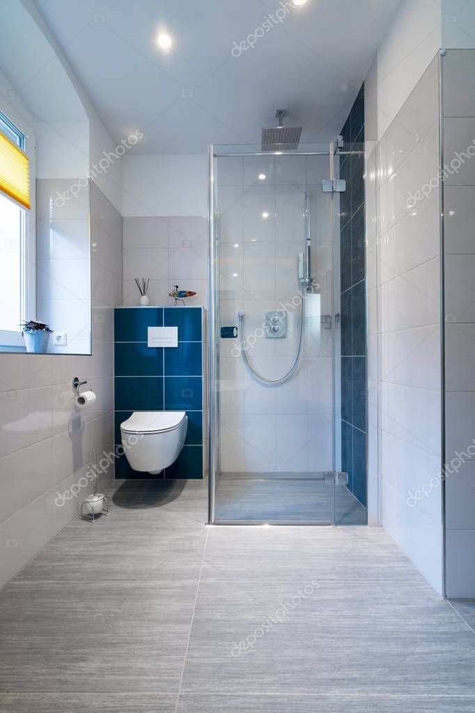 Luxury Bathroom with walk in Glass Shower Vertical shot of a luxury bathroom with large, walk