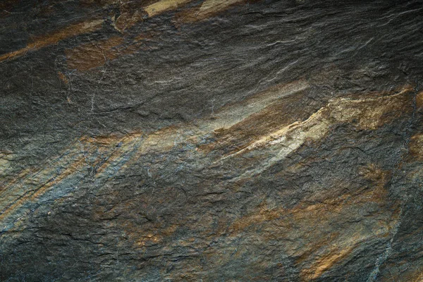 Um minério cinza dourado abstrato fundo textura mineral — Fotografia de Stock