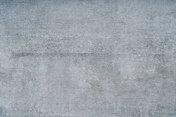 Egy szürke göröngyös betonfal textúra — Stock Fotó