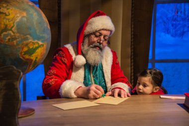 Küçük bir kız tarafından imzalanmış Noel Kartpostalı. 