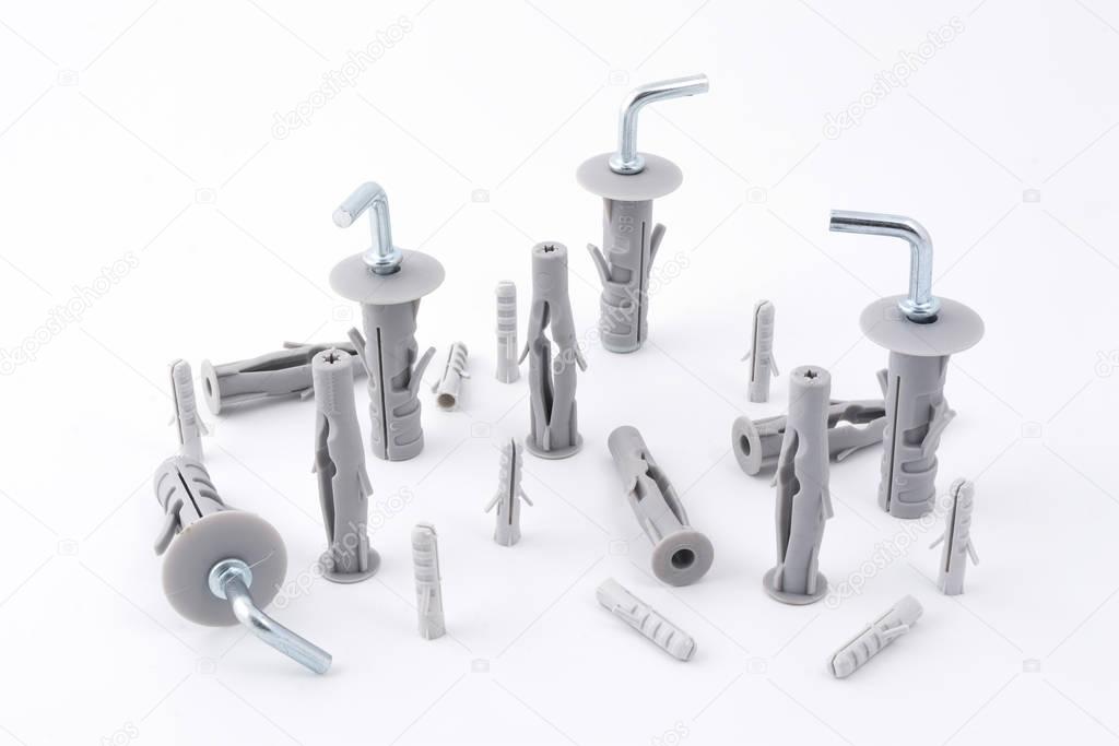 metal clips with plastic wall plugs