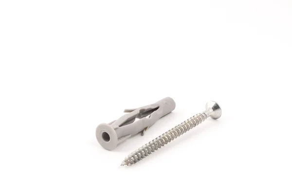 A screw with plastic plug — Stock Photo, Image