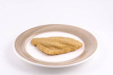 plaka üzerinde dondurulmuş fileto kotletpane yaldızlı pisibalığı