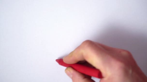 Σχεδιάστε Ένα Ένα Κραγιόνι Κεριών Ένα Φύλλο Από Λευκό Χαρτί — Αρχείο Βίντεο