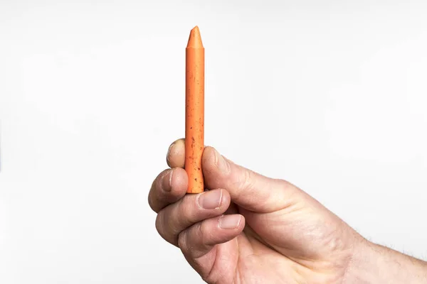 Orange Wax Crayon Hand — Stock Photo, Image