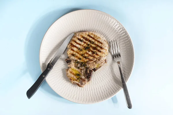A grilled pork chop — 스톡 사진