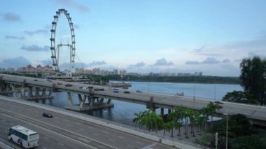 Singapore. January 2020. a panoramic view of the Ferris wheel at sunset