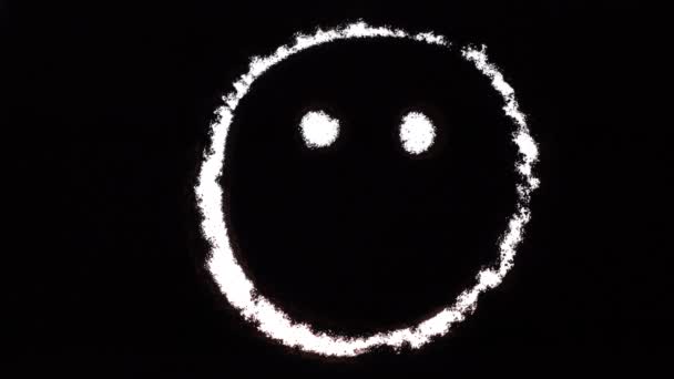 Drawing Smiling Face Dark Sand Illuminated Surface — Stock Video