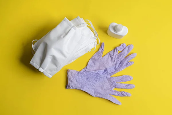 Protective Masks Disinfectant Disposable Latex Gloves Colored Surface — Stock Photo, Image