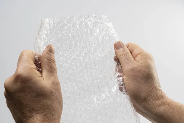 Sheet Plastic Bubble Padding Your Hands — Stock Photo, Image