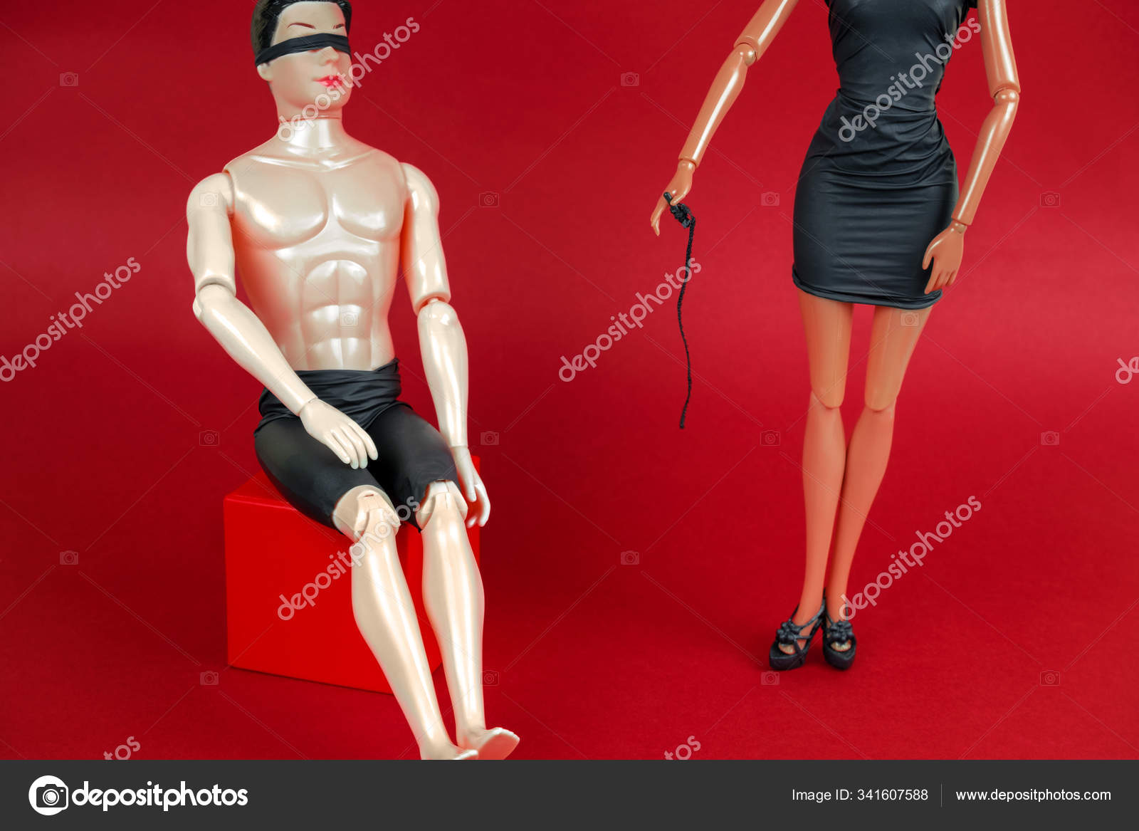 Blindfolded Man Woman Black Leather Dress Holding Whip Red Background Stock Photo by ©dvulikaia 341607588