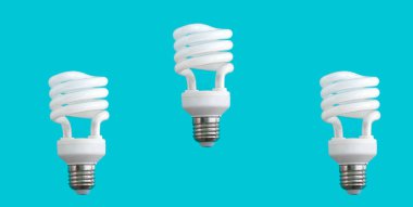 Mavi arkaplan üzerinde yükselen üç spiral ampul