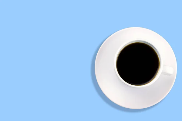 Κορυφή Προβολή Λευκό Φλιτζάνι Καφέ Ένα Μπλε Φόντο Αντίγραφο Χώρου — Φωτογραφία Αρχείου